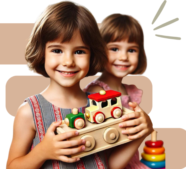 Two young girls smile at the camera; the one in front holds a wooden toy train, while the other stands behind her. Colorful stacking rings appear in the background.